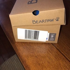 Bear paw slippers. NWOT. Women’s size 9. Brand new. Never worn. Blue